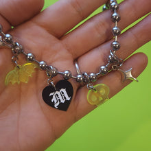 BLACK AND WHITE HEART LETTER CHARMS