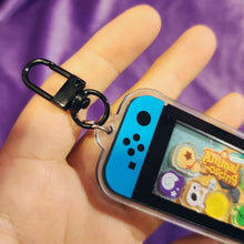 Cozy Village Shaker Keychain – Gamer-Inspired Acrylic Charm