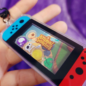 Cozy Village Shaker Keychain – Gamer-Inspired Acrylic Charm