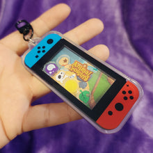 Cozy Village Shaker Keychain – Gamer-Inspired Acrylic Charm