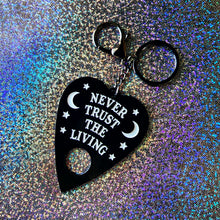 Never Trust the Living Enamel Keychain - glow in the dark